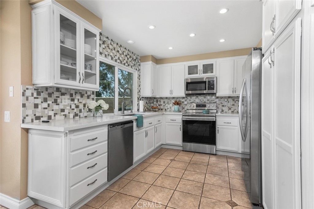 Remodeled Kitchen with Crisp White Cabinetry - 10 Windflower, Aliso Viejo CA 92656 - photo 7