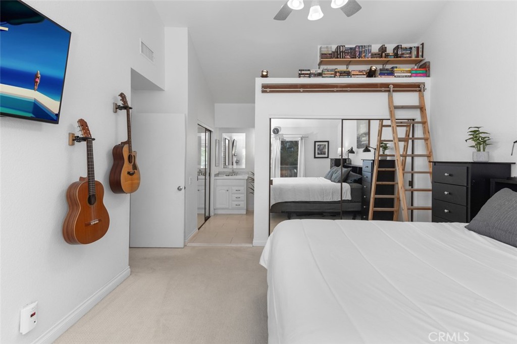 Vaulted Ceiling in the Primary Bedroom features a Book Nook - 10 Windflower, Aliso Viejo CA 92656 - photo 21