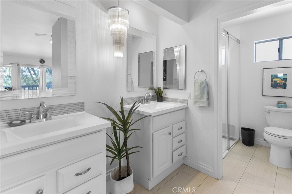 En suite Primary Bathroom with Dual Sinks - 10 Windflower, Aliso Viejo CA 92656 - photo 22