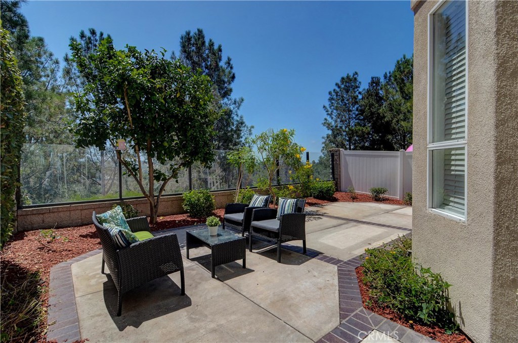 Private rear yard is a true paradise with plenty of entertaining space and panoramic view...plus low maintenance! - 16 Hawksmoor, Aliso Viejo CA 92656 - photo 1