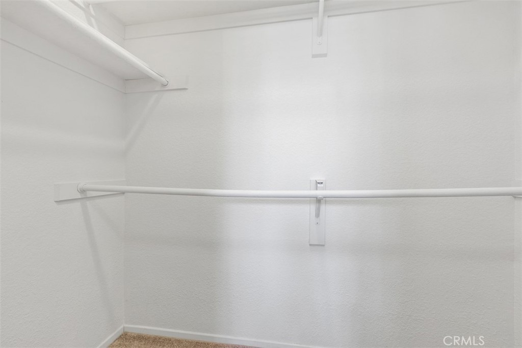 Bed 1 walk in closet - 195 Cinnamon Teal, Aliso Viejo CA 92656 - photo 16