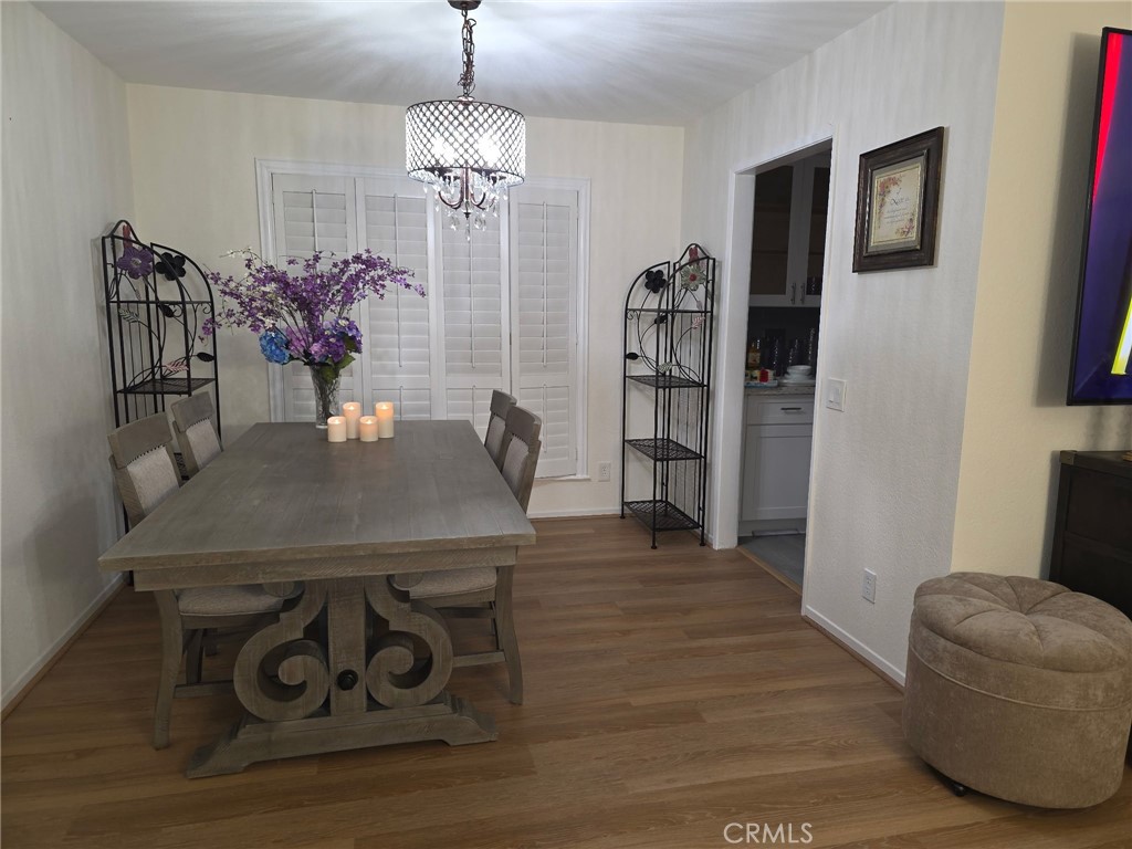 Dining Area with Laminate Floors, Plantation Shutters, Nice Lighting Fixture - 21 CAMBRIA Lane, Aliso Viejo CA 92656 - photo 9