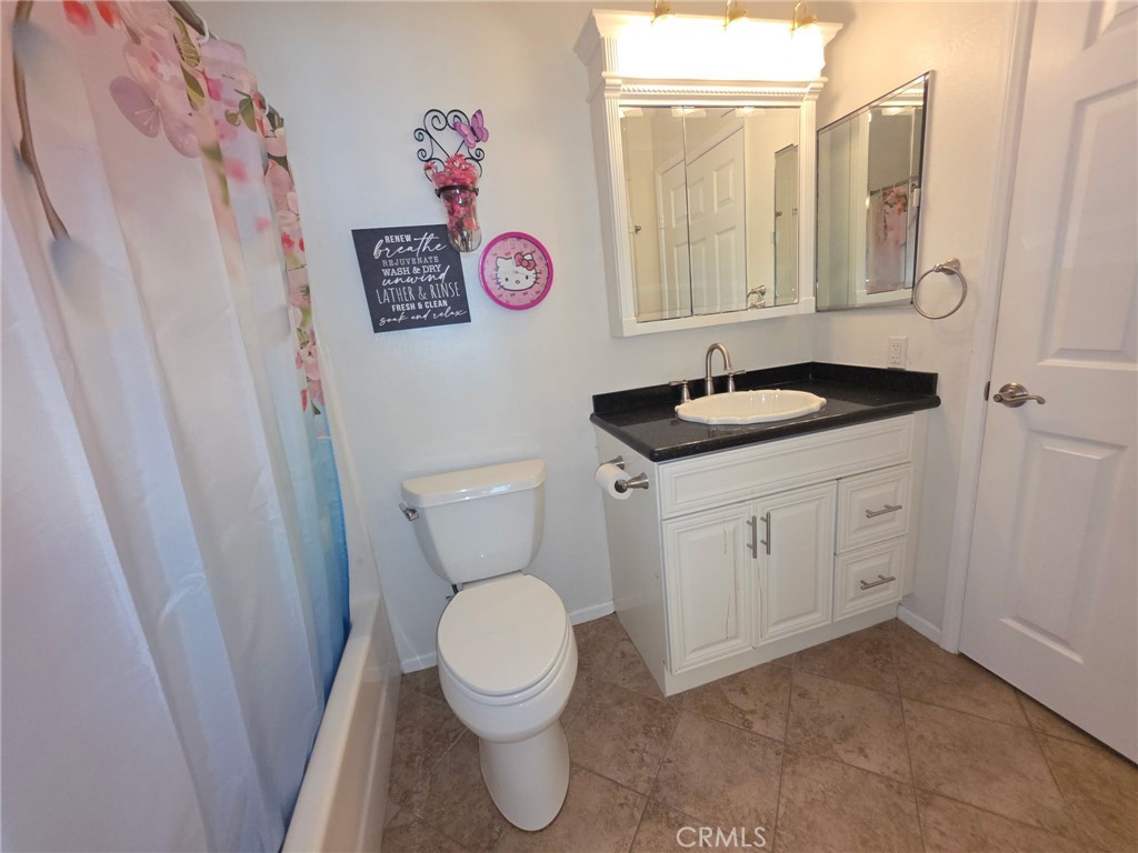 Bathroom with Scalloped Ceramic Sink - 21 CAMBRIA Lane, Aliso Viejo CA 92656 - photo 20