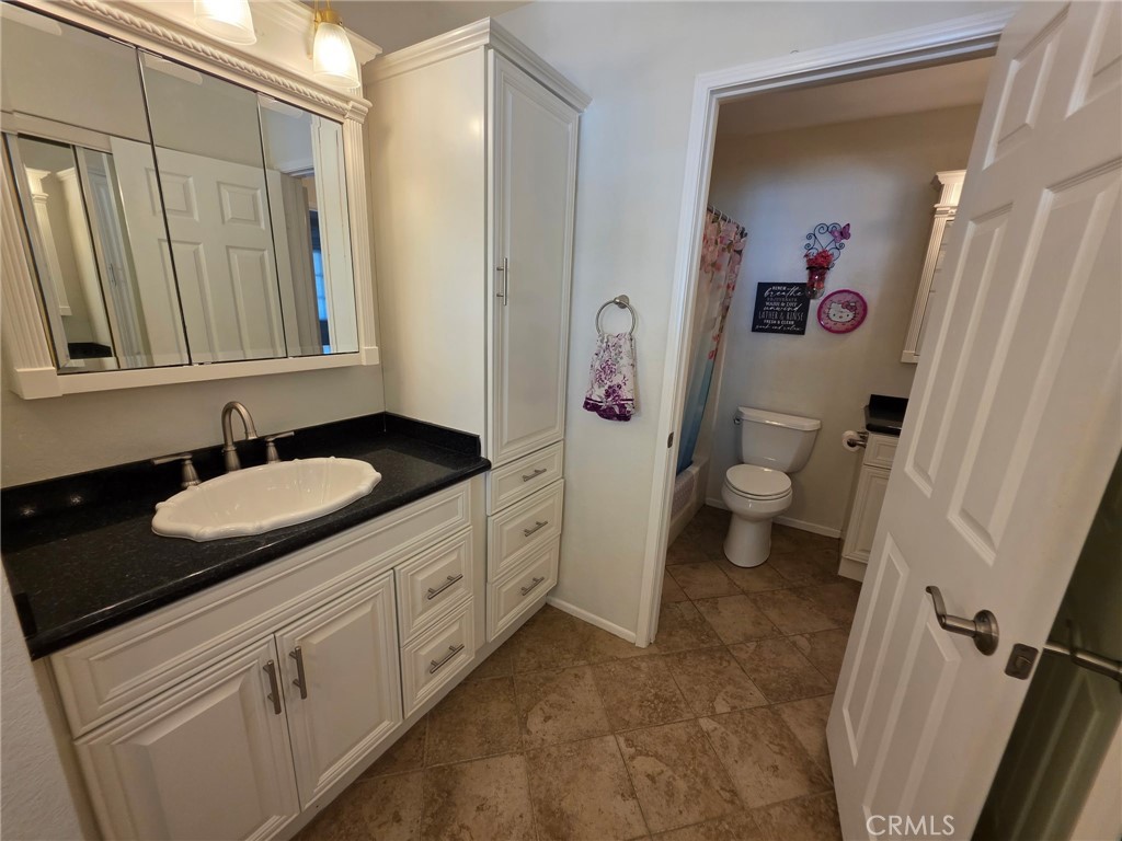 Second Scalloped Ceramic Sink in the Primary Bedroom. There are 2 Sinks. - 21 CAMBRIA Lane, Aliso Viejo CA 92656 - photo 27
