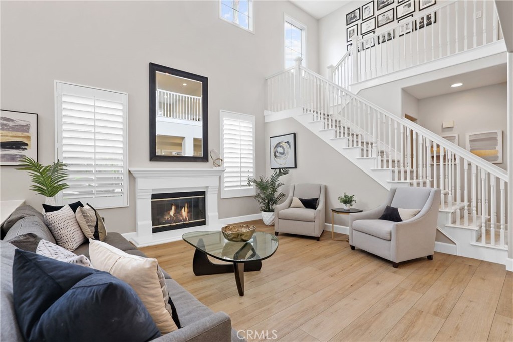 Inviting Living Room with 2-Story Ceilings - 22 Sunswept Mesa, Aliso Viejo CA 92656 - photo 1