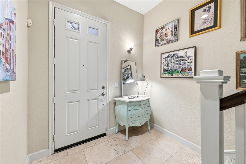 Ground floor entry to work space, garage and stairs to living spaces - 23 Vantis, Aliso Viejo CA 92656 - photo 5