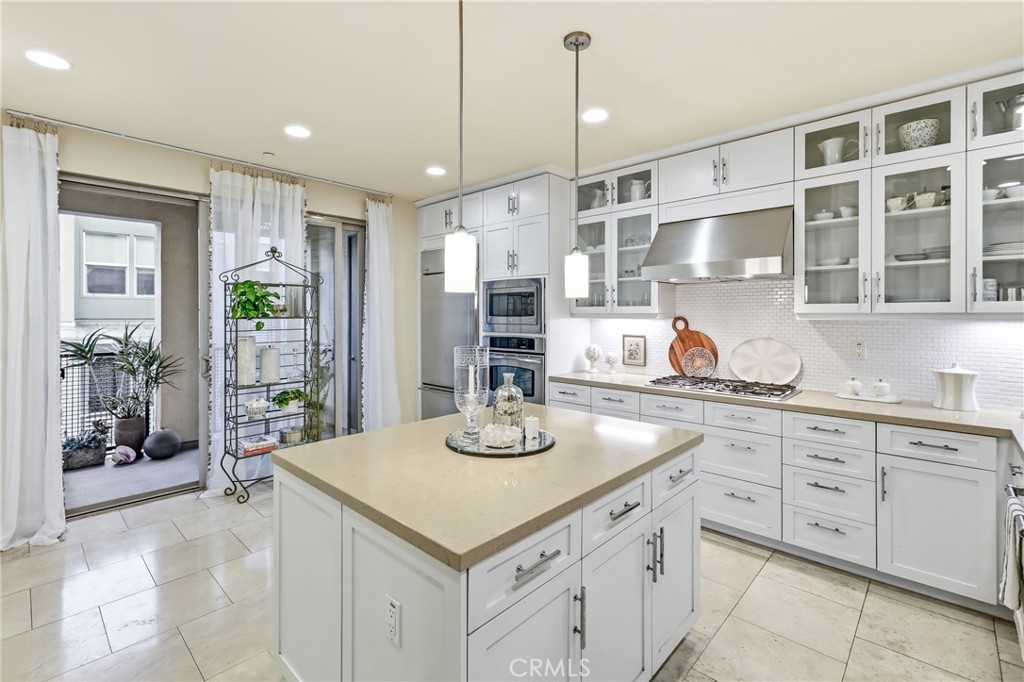 Large balcony off kitchen faces east for morning coffee - 23 Vantis, Aliso Viejo CA 92656 - photo 8