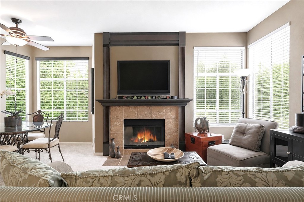 Digitally Altered - added fire & trees outside right window - 23412 Pacific Park 28D, Aliso Viejo CA 92656 - photo 8