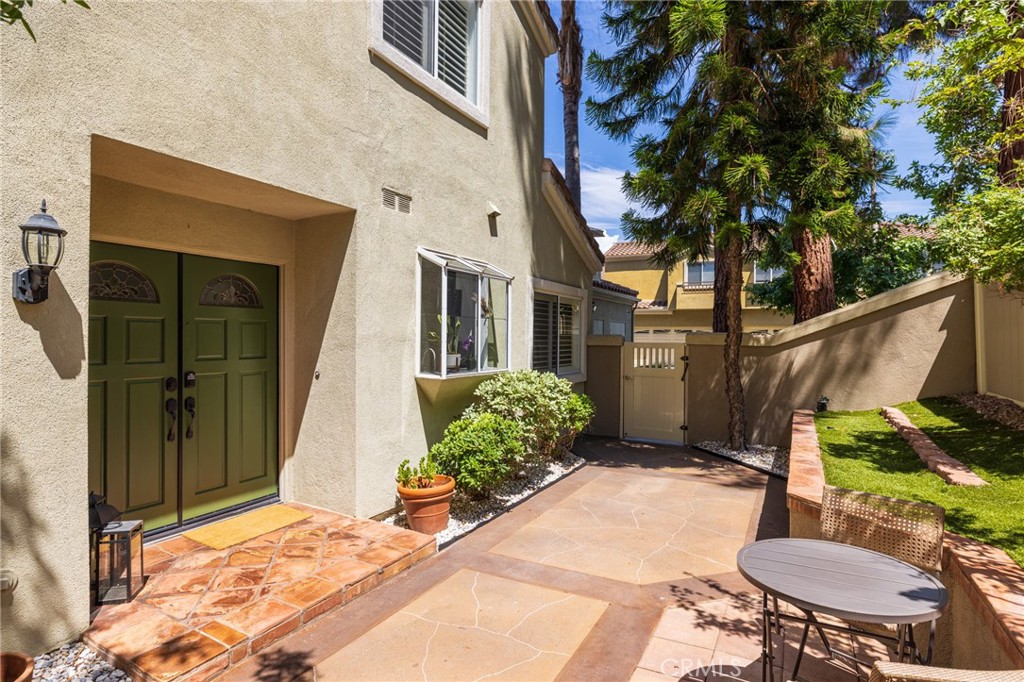 Double door entry and private wrap around patio. - 27 Alicante, Aliso Viejo CA 92656 - photo 1