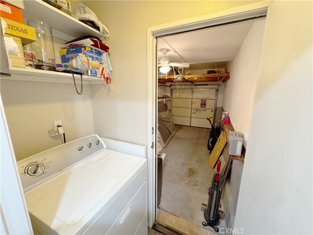 Convenient in-unit laundry with overhead storage and direct access to private single-car garage. - 29 Waxwing, Aliso Viejo CA 92656 - photo 23