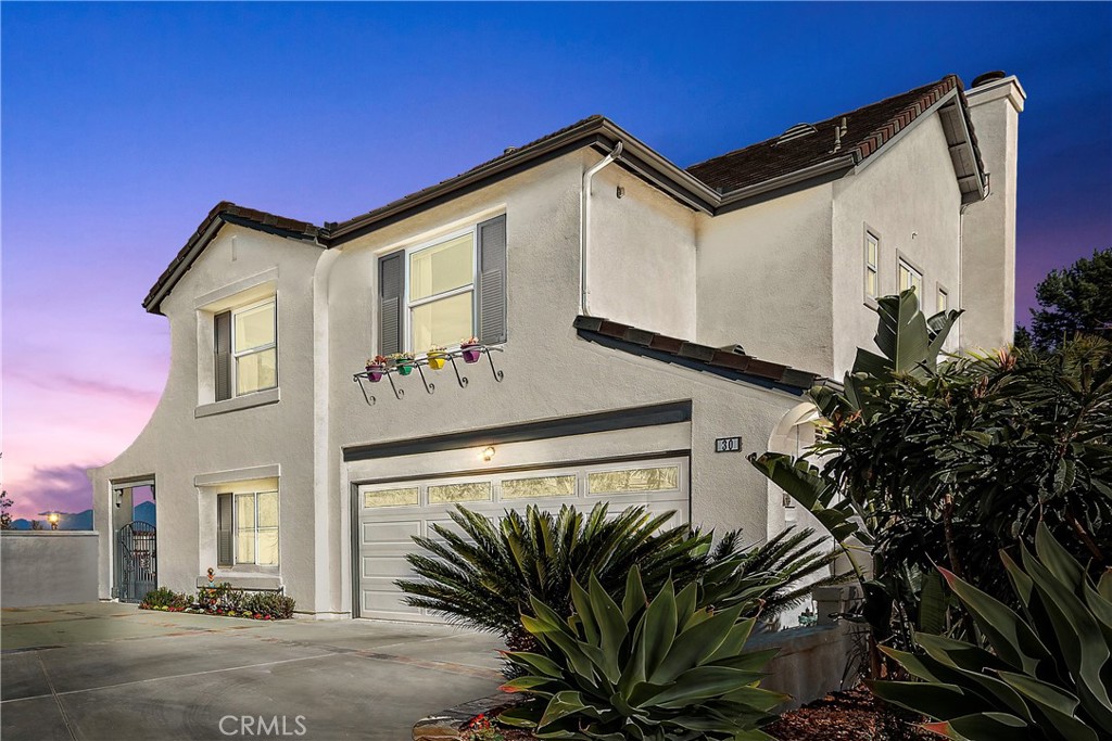 Enjoy stunning sunrise views out the back and then sunset views from the front. - 30 Country Walk Drive, Aliso Viejo CA 92656 - photo 1
