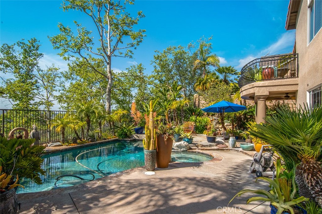 Resort style back patio and pool with canyon and blue sky views - 35 Merlin Avenue, Aliso Viejo CA 92656 - photo 1