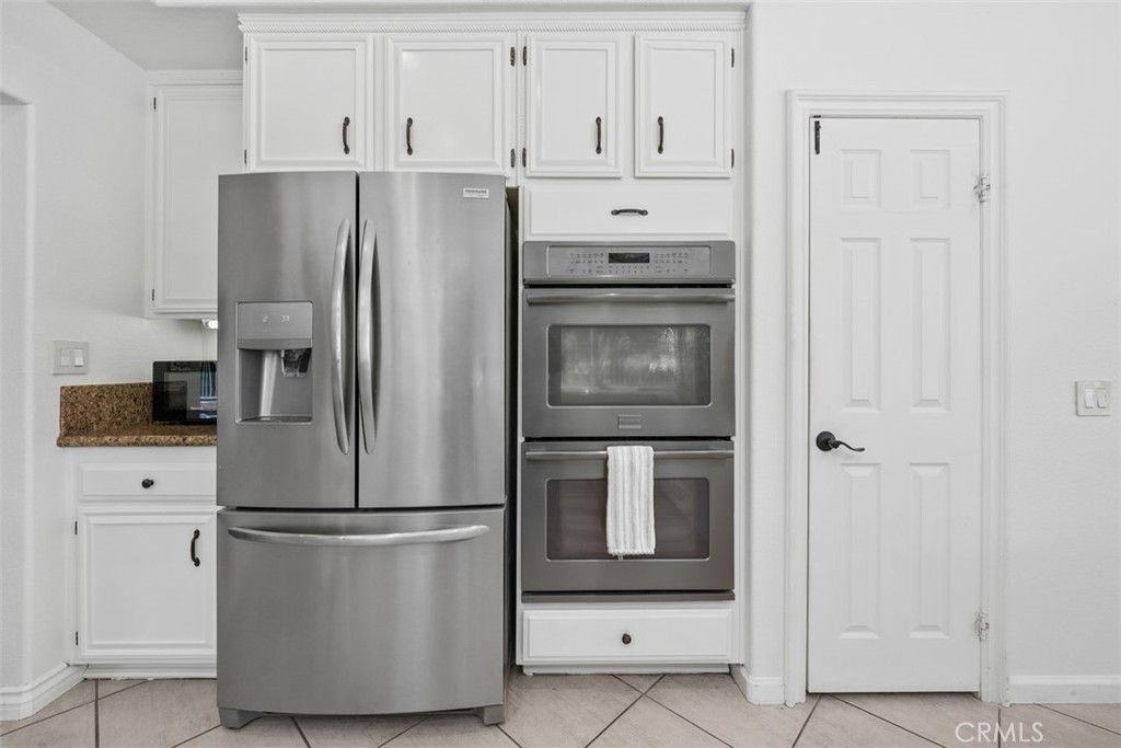 double oven and walk in pantry - 36 Tanglewood, Aliso Viejo CA 92656 - photo 9