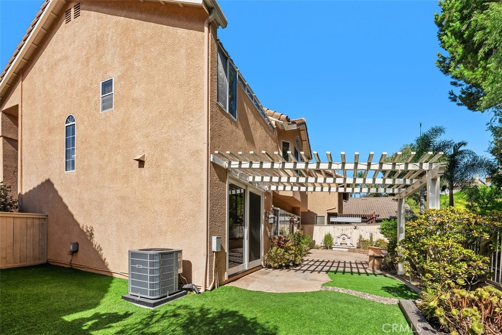 spacious backyard with artificial turf - 36 Tanglewood, Aliso Viejo CA 92656 - photo 28