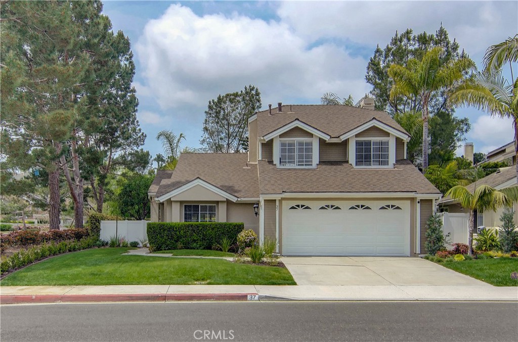 Freshly landscaped front yard. Need even more space? This home sides to the greenbelt/park! - 37 Briarglenn, Aliso Viejo CA 92656 - photo 1