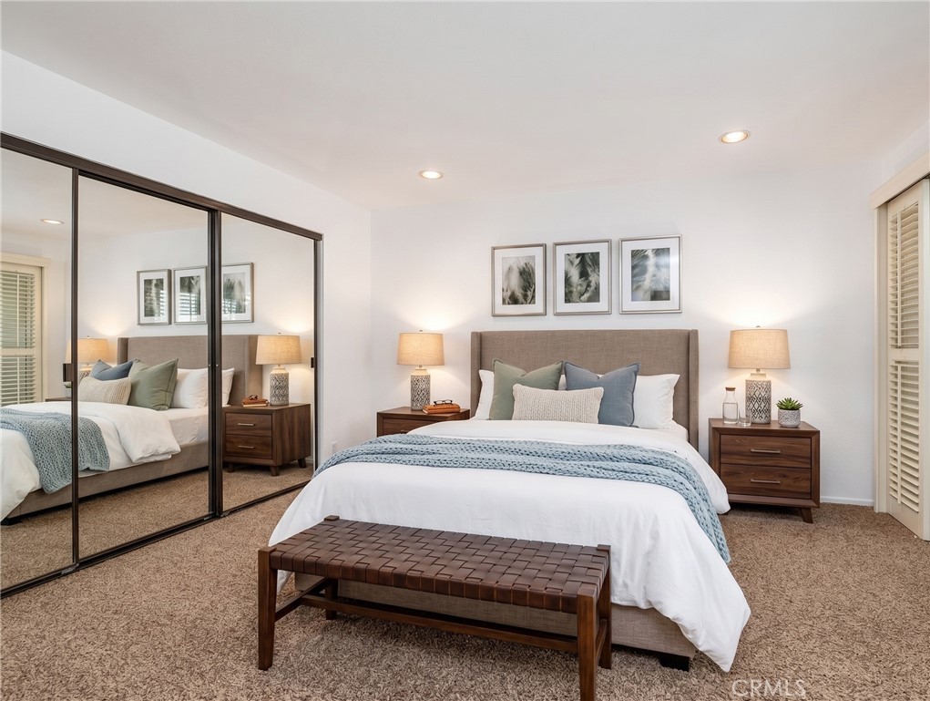 Staged bedroom with AI-enhanced virtual furniture. - 40 Hollyhock, Aliso Viejo CA 92656 - photo 17