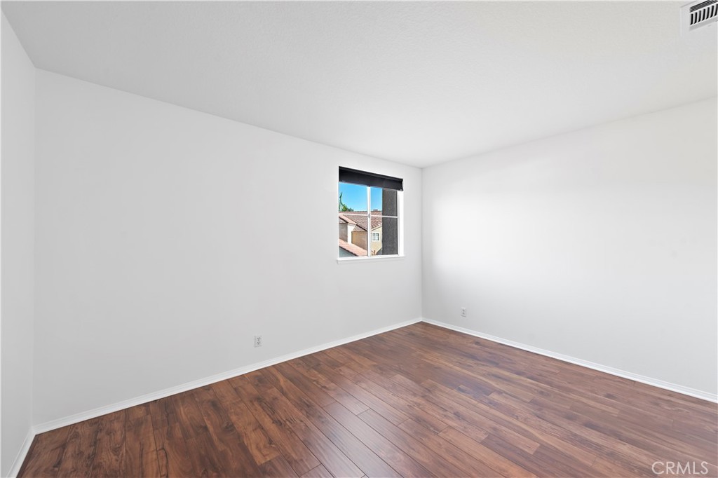 Secondary bedroom with ensuite and a TV. - 47 Donatello, Aliso Viejo CA 92656 - photo 17