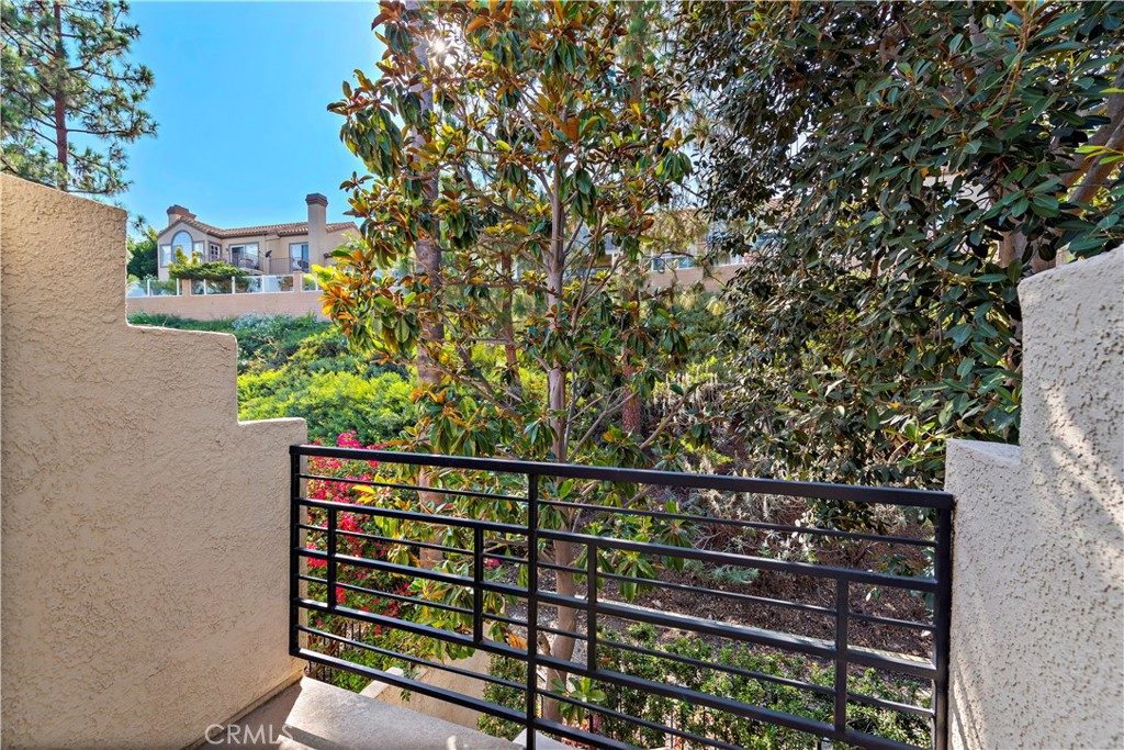 Primary suite balcony offers privacy and green foliage views of the hillside. Additional private outdoor space. - 47 Donatello, Aliso Viejo CA 92656 - photo 19