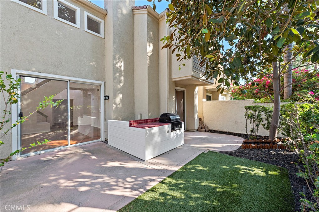 Private yard with upgraded landscaping and built in outdoor ship lapped entertainment island. Please note the BBQ is for - 47 Donatello, Aliso Viejo CA 92656 - photo 21