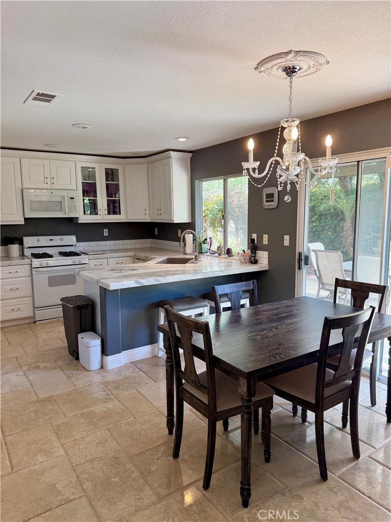 Dining area sits open to the kitchen, easy for everyday meals or entertaining - 6 Mallorn, Aliso Viejo CA 92656 - photo 9