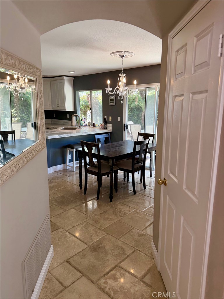 Travertine flooring runs through the entire main level - 6 Mallorn, Aliso Viejo CA 92656 - photo 13