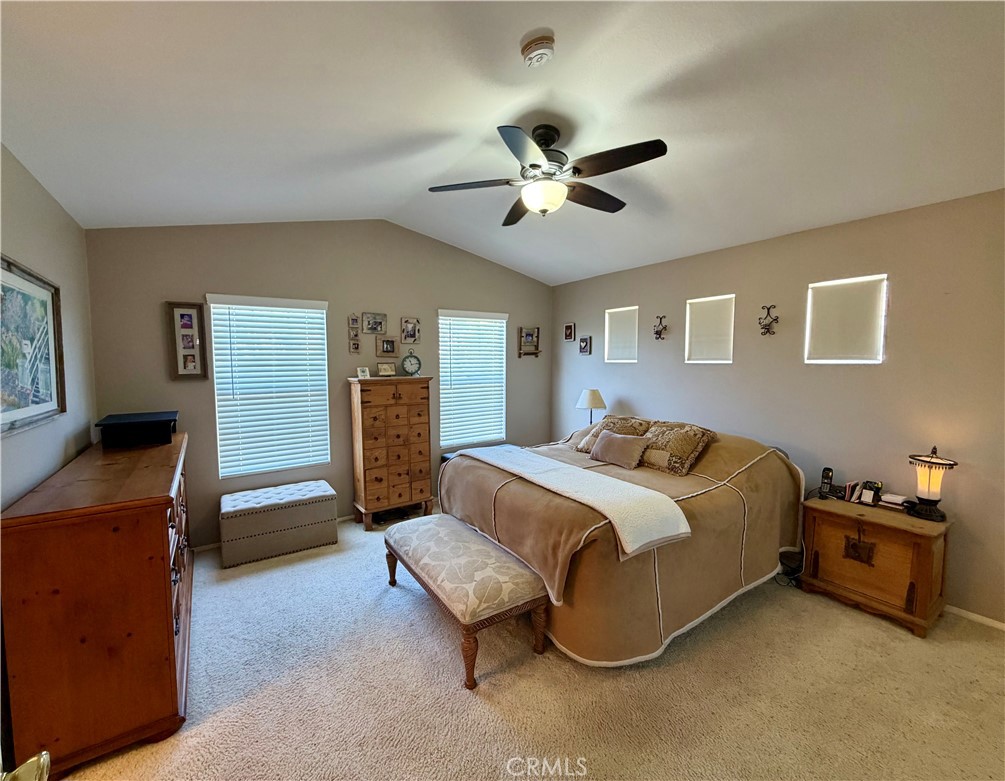 Primary suite with a vaulted ceiling and ceiling fan, generous natural light - 6 Mallorn, Aliso Viejo CA 92656 - photo 14