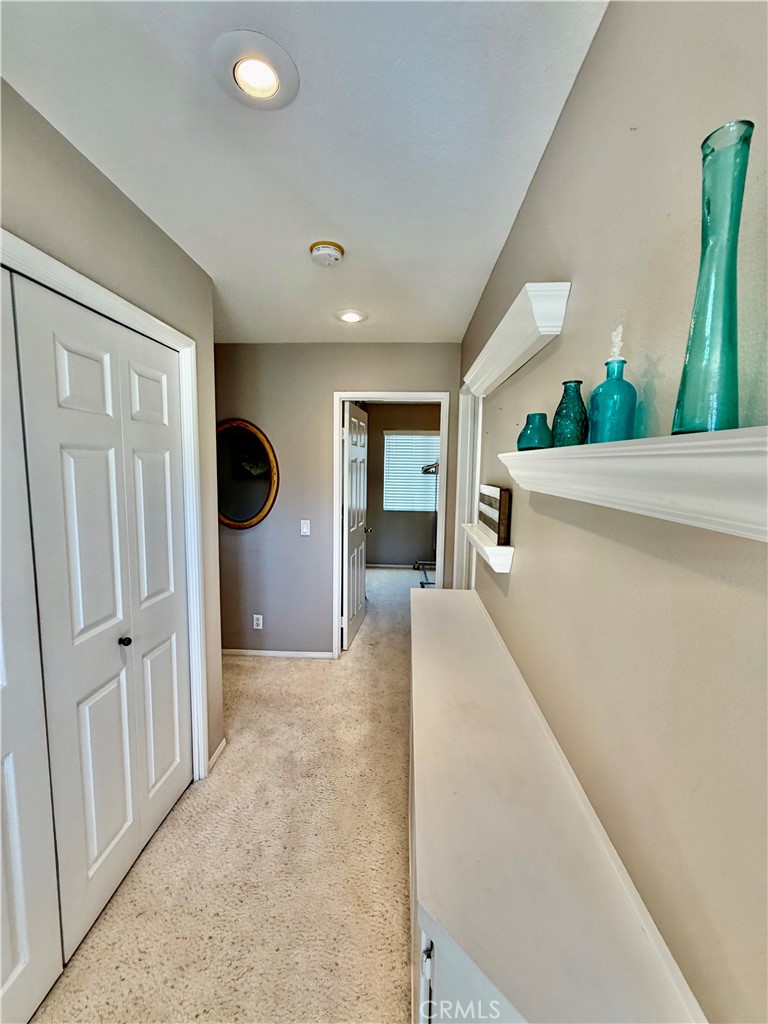 Laundry tucked behind doors with overhead cabinetry, right where you need it - 6 Mallorn, Aliso Viejo CA 92656 - photo 24