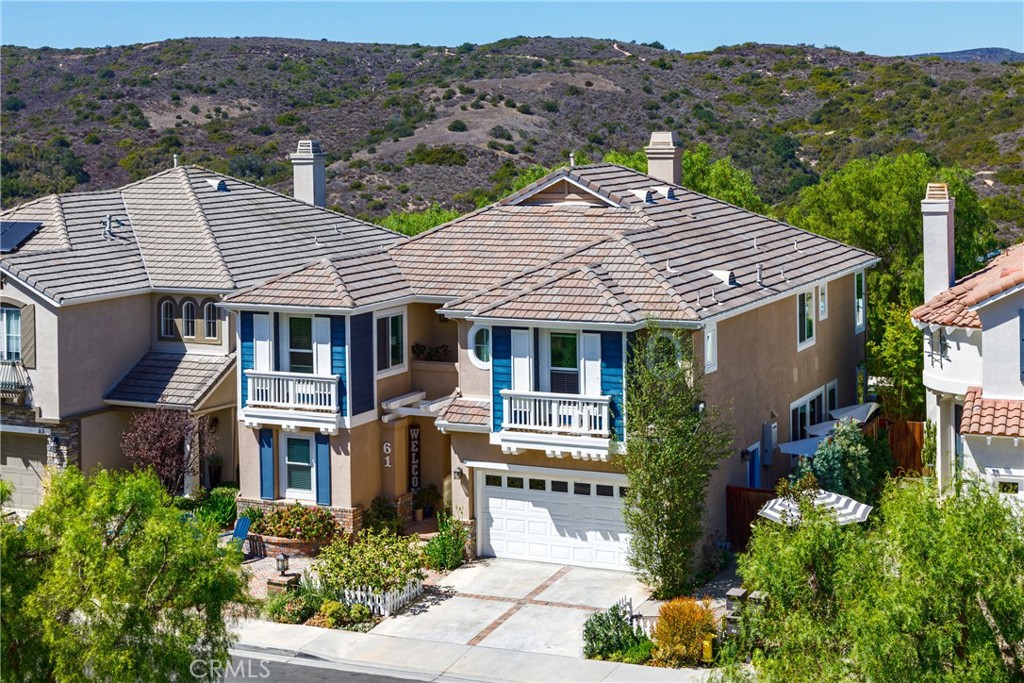 Prime location on a single loaded street. One of the most coveted floor plans in Aliso Viejo! - 61 Sprucewood, Aliso Viejo CA 92656 - photo 1