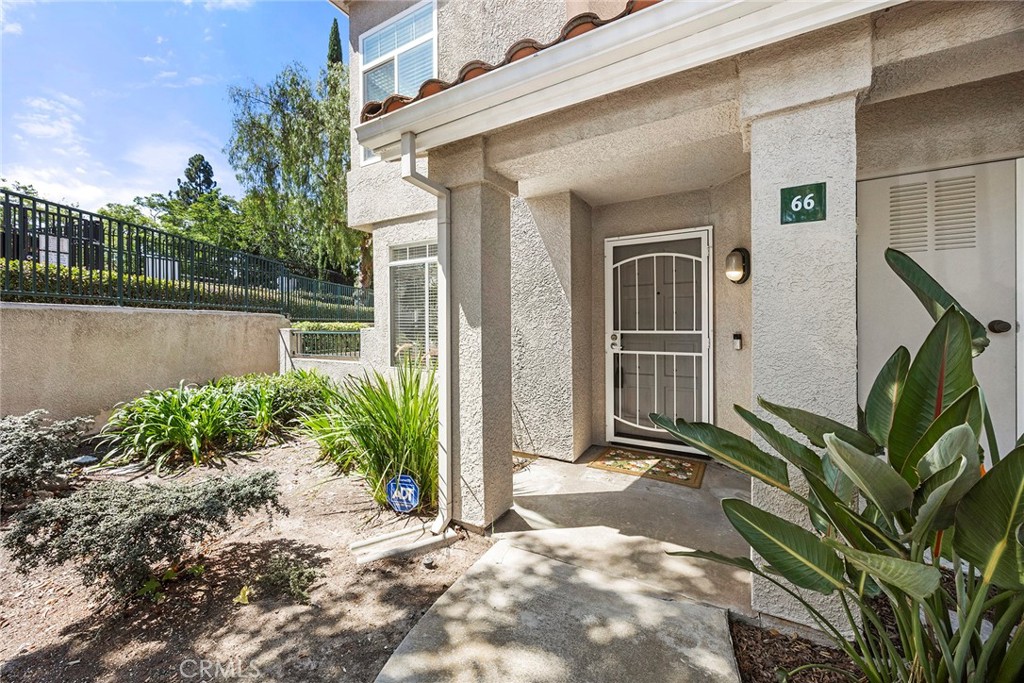 One of the most desirable locations in the community. This private end-unit features no one above or below in a peaceful - 66 Cinnamon Teal, Aliso Viejo CA 92656 - photo 2