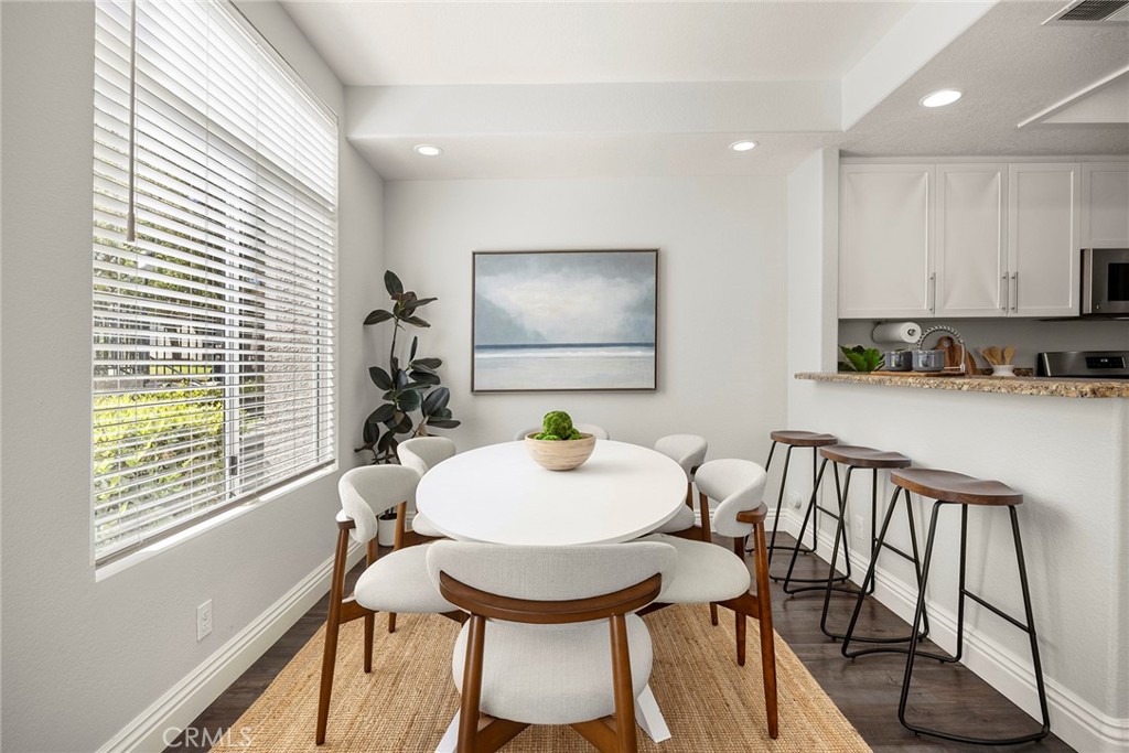 Morning coffee, family dinners, game nights, and celebrations... this inviting dining space is ready to host them all. - 66 Cinnamon Teal, Aliso Viejo CA 92656 - photo 11