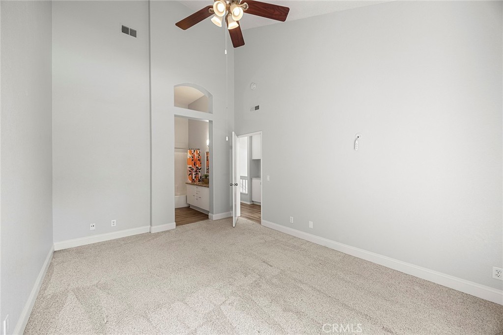 Another view of the primary suite looking towards the bath area. - 66 Cinnamon Teal, Aliso Viejo CA 92656 - photo 23