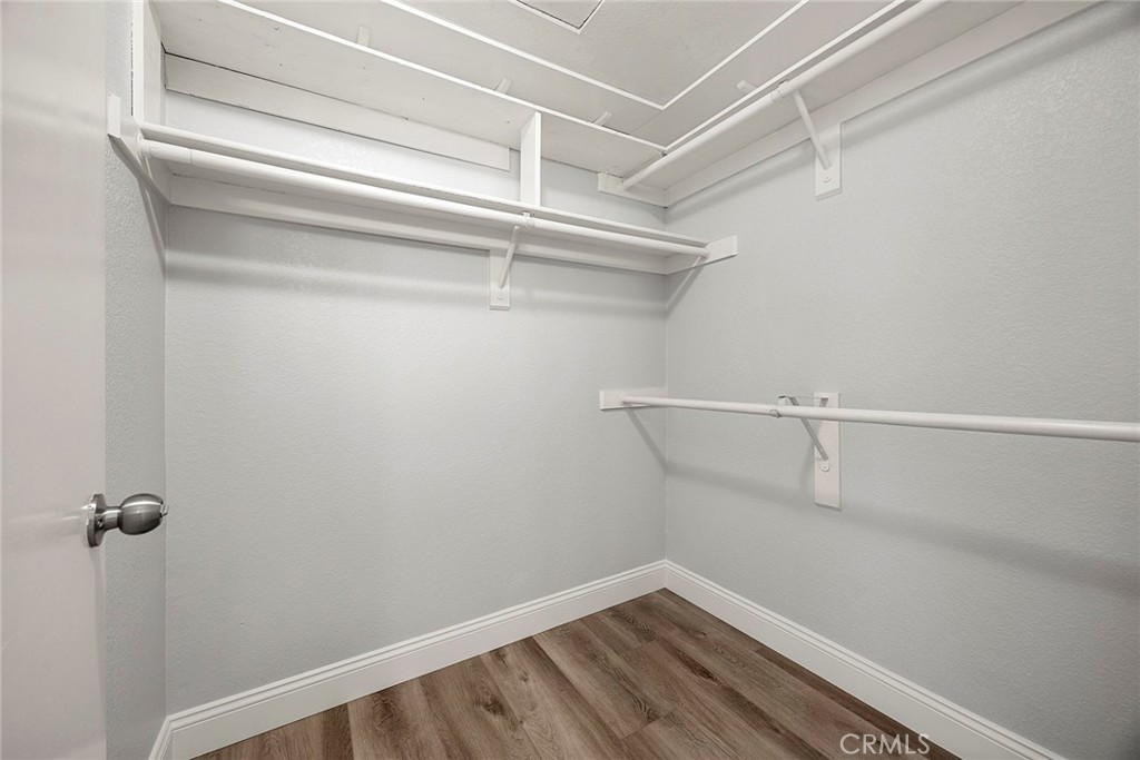 Complete with built-in shelving and generous hanging space, the spacious walk-in closet offers plenty of room to keep yo - 66 Cinnamon Teal, Aliso Viejo CA 92656 - photo 25