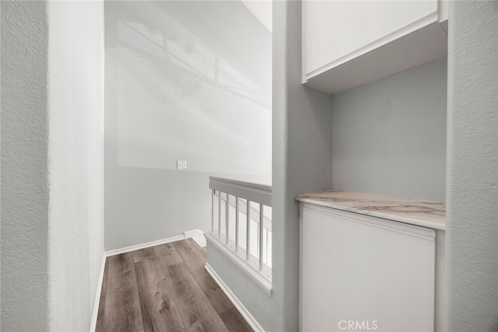 Thoughtfully designed with everyday living in mind, the upstairs landing includes a built-in linen cabinet with addition - 66 Cinnamon Teal, Aliso Viejo CA 92656 - photo 31