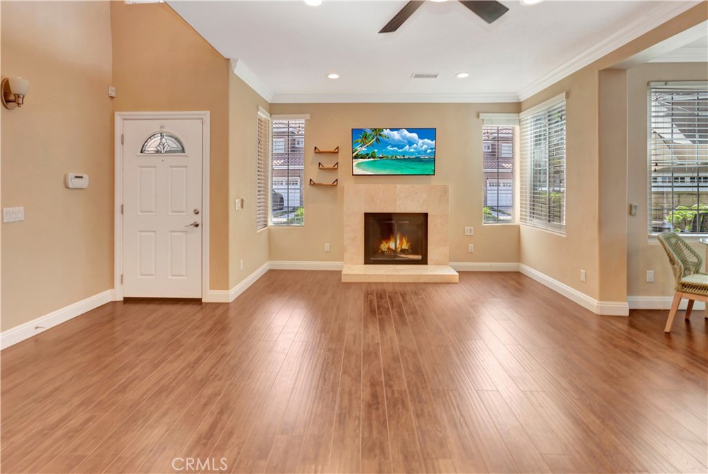 Front door entry into living room/Family room - 84 Matisse, Aliso Viejo CA 92656 - photo 4