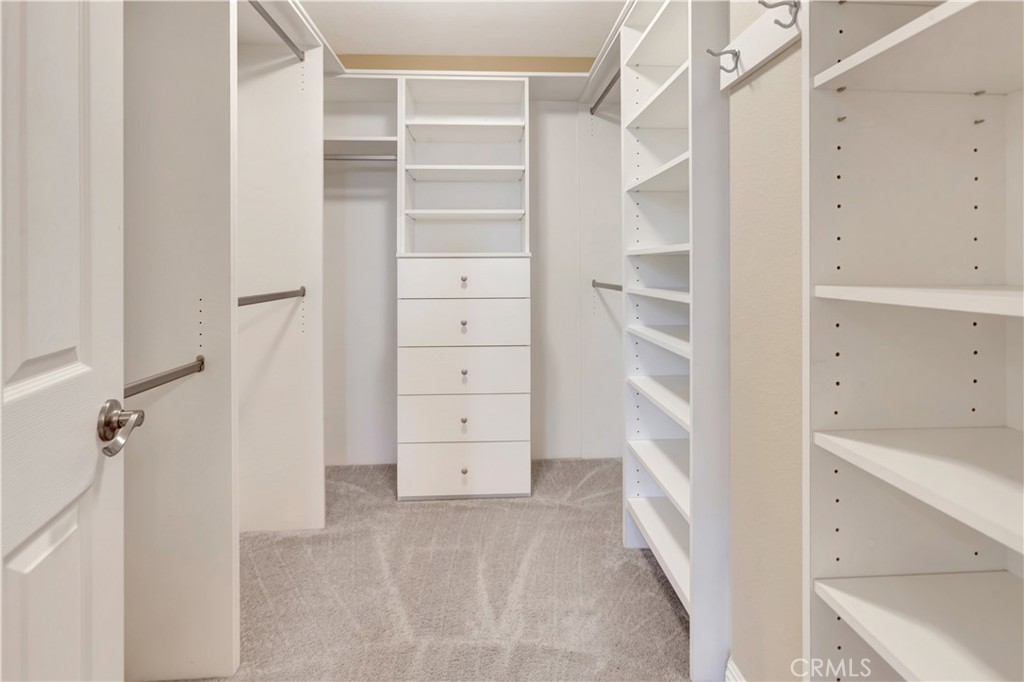 Walk-in closet / Primary bedroom - 84 Matisse, Aliso Viejo CA 92656 - photo 18