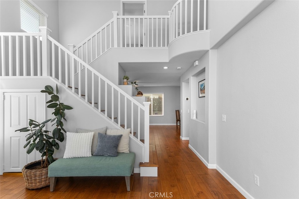 Light and Bright Staircase Railings Modernize the Home, along with extra storage space under the stairs - 9 Sequoia, Aliso Viejo CA 92656 - photo 4