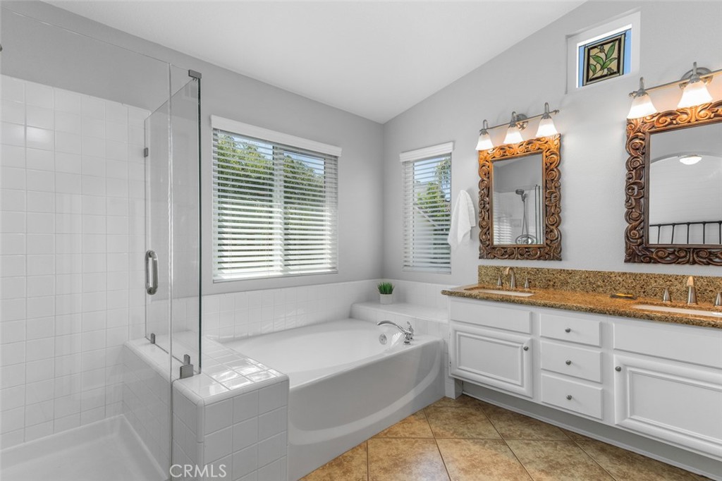 Ensuite Primary Bathroom has a Dual Sink Vanity area with light and bright cabinets - 9 Sequoia, Aliso Viejo CA 92656 - photo 19