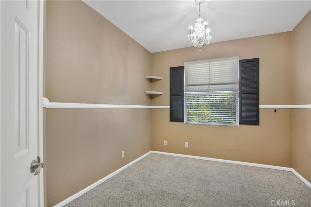 Secondary bedroom now has a ceiling fan - 1069 S Positano, Anaheim Hills CA 92808 - photo 11