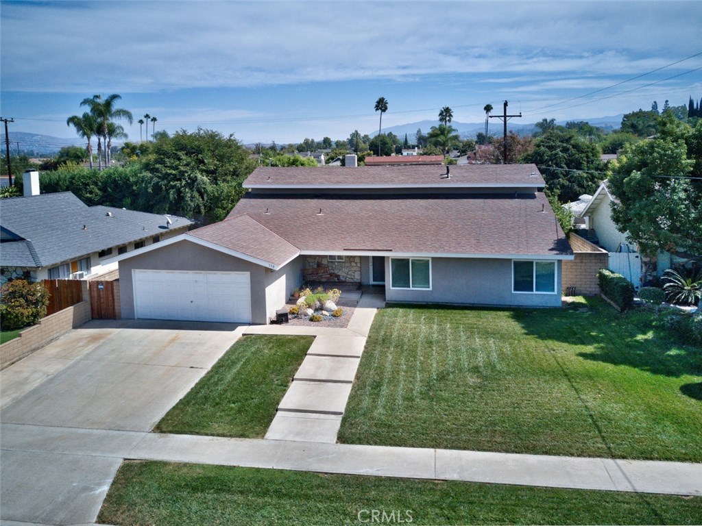 Welcome home to this wonderful Anaheim Hills home that's just steps away from Peralta Canyon Park. - 130 N Jerrilee Lane, Anaheim Hills CA 92807 - photo 1