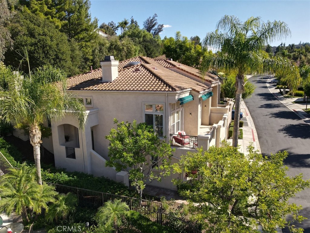 End Unit Surround by Trees & HOA Gardens - 348 S San Vicente Lane, Anaheim Hills CA 92807 - photo 1