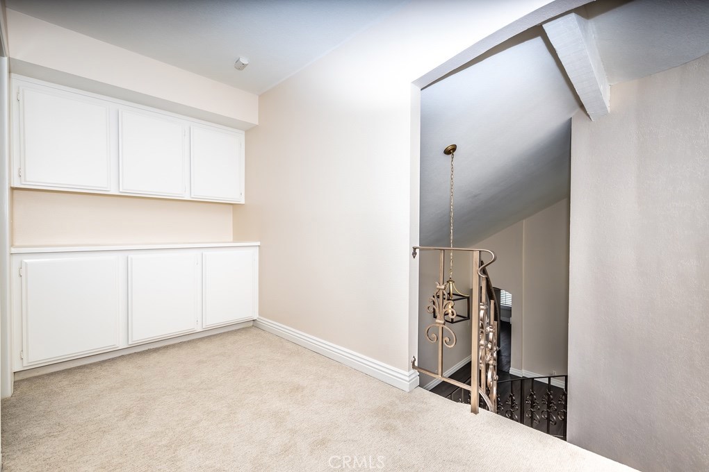 Upstairs landing area. - 4711 E Fairfield Street, Anaheim Hills CA 92807 - photo 32