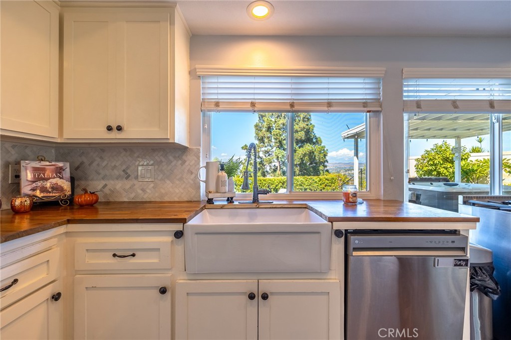 Farmhouse sink and Garden Window out to the backyard and Views! - 5217 E Rolling Hills Drive, Anaheim Hills CA 92807 - photo 19