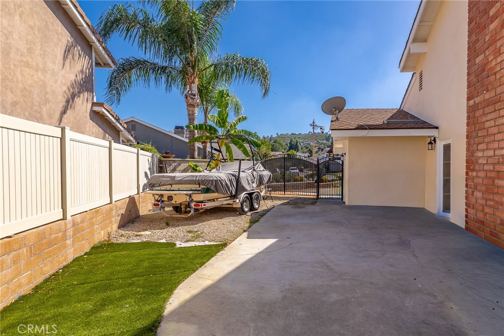 Side RV/Boat Parking, Gated Area and access from the driveway. - 5217 E Rolling Hills Drive, Anaheim Hills CA 92807 - photo 56