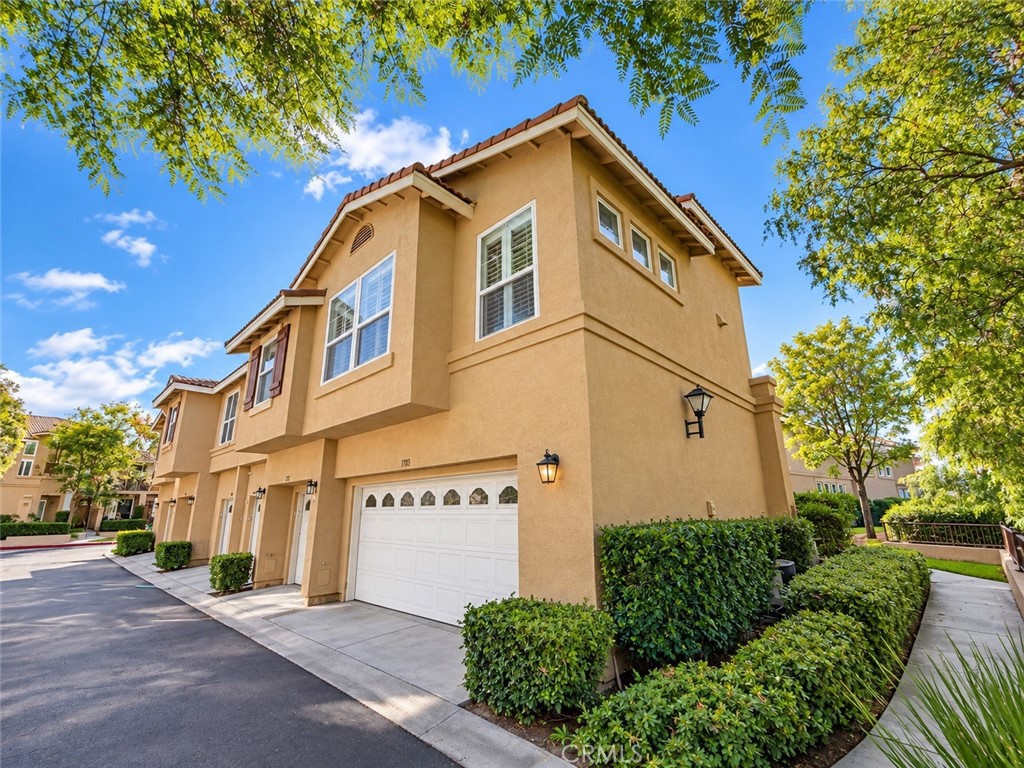 End unit with no one above or below and 2-car garage - 7723 East Portofino Avenue, Anaheim Hills CA 92808 - photo 1