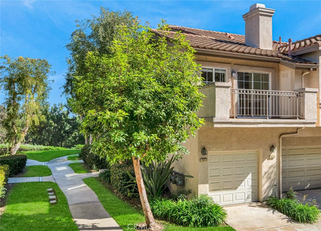 Treelined walkway to front door - 7973 E Viewrim, Anaheim Hills CA 92808 - photo 1