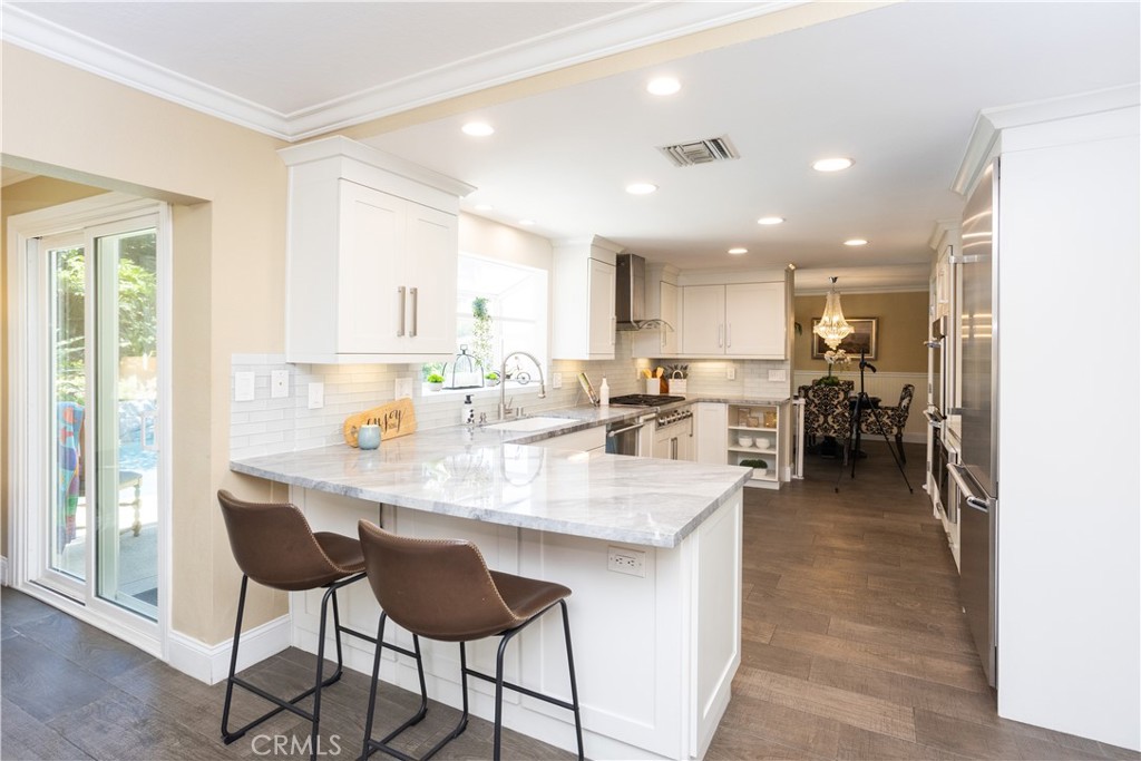 Kitchen Opens to the Family Room - 8505 E Meadowridge, Anaheim Hills CA 92808 - photo 20