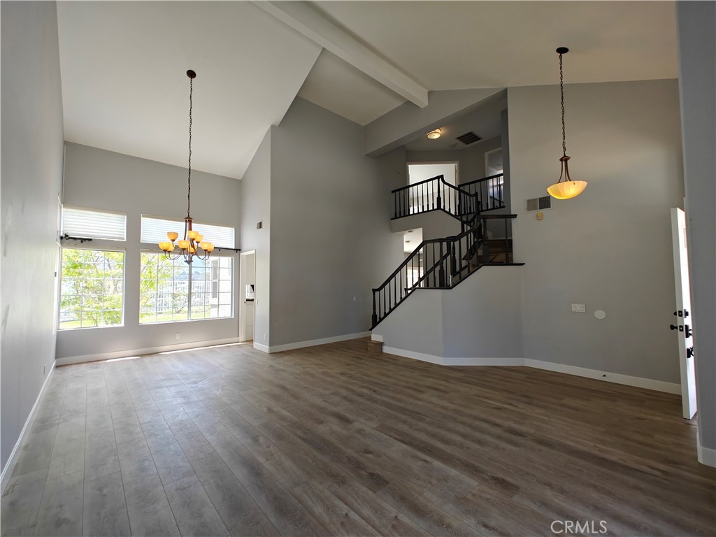 High vaulted ceiling with amp of natural - 8604 E Windsong Drive, Anaheim Hills CA 92808 - photo 1