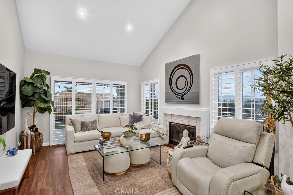 Fireside Living Room with Slider to Backyard - 881 S Trailblazer Circle, Anaheim Hills CA 92807 - photo 7