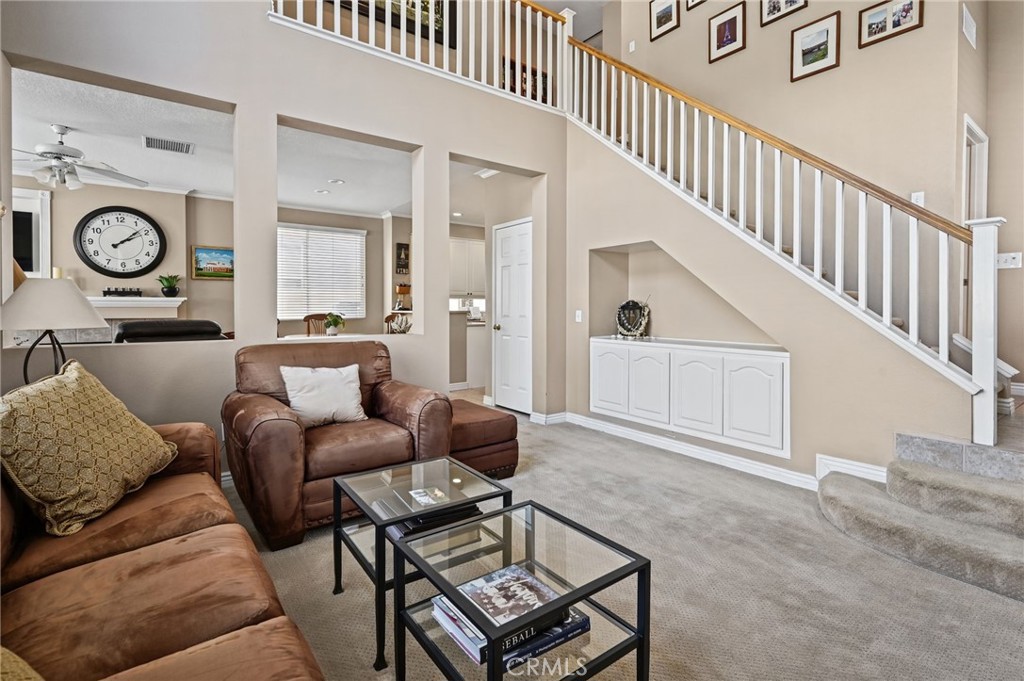 The Living Room with the stairs leading to the bedrooms - 1028 S Brianna Way, Anaheim CA 92808 - photo 12