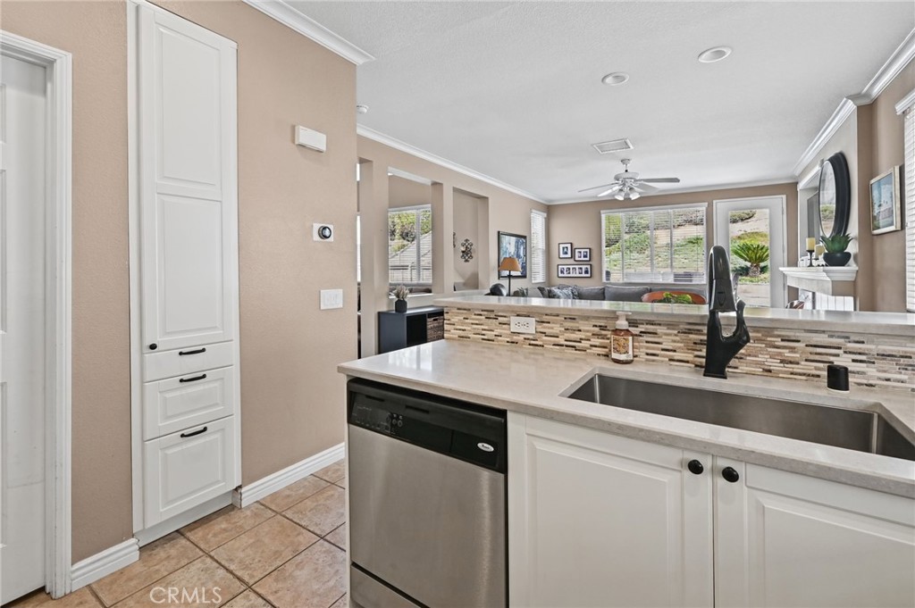 Remodeled Kitchen has soft close cabinets and pull outs in some of the drawers. - 1028 S Brianna Way, Anaheim CA 92808 - photo 18